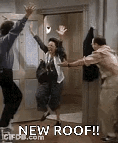 A Man And A Woman Are Jumping In The Air In A Room With The Words `` New Roof '' . GIF