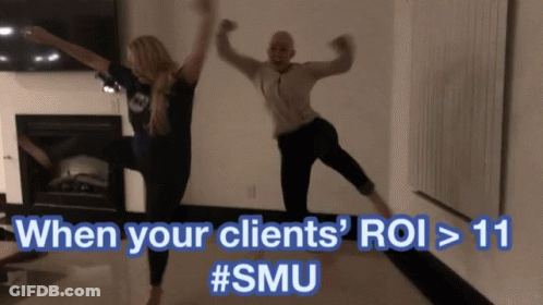 A Man And A Woman Are Jumping In The Air With The Caption When Your Clients Roi > 11 GIF