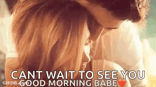 A Man And A Woman Are Kissing And Hugging Each Other . GIF