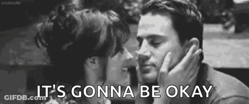 A Man And A Woman Are Kissing In A Black And White Photo . GIF