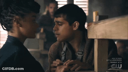 A Man And A Woman Are Kissing In A Scene From Dc 'S Legends GIF