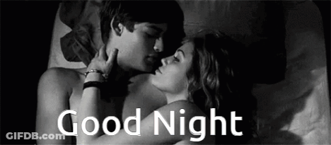 A Man And A Woman Are Kissing In Bed With The Words `` Good Night '' Written Above Them . GIF