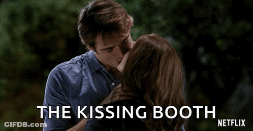 A Man And A Woman Are Kissing In The Kissing Booth Netflix Movie . GIF