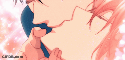 A Man And A Woman Are Kissing With Tears Coming Down Their Faces GIF