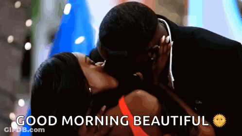 A Man And A Woman Are Kissing With The Words `` Good Morning Beautiful '' Below Them . GIF