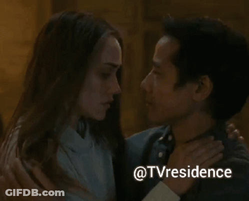 A Man And A Woman Are Kissing With The Words @Tvresidence Written Below Them GIF
