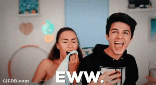 A Man And A Woman Are Laughing With The Words Eww Written On The Bottom GIF