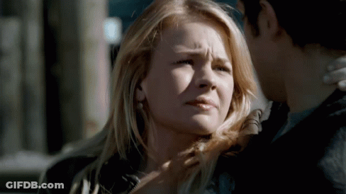 Man And Woman Looking At Each Other Sad Face GIF