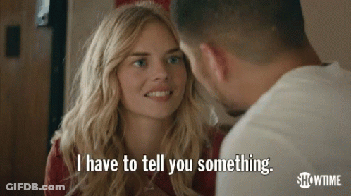 A Man And A Woman Are Looking At Each Other And The Woman Is Saying " I Have To Tell You Something " . GIF