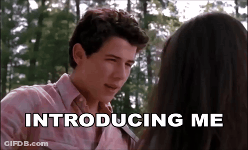 A Man And A Woman Are Looking At Each Other And The Words Introducing Me Are Above Them GIF