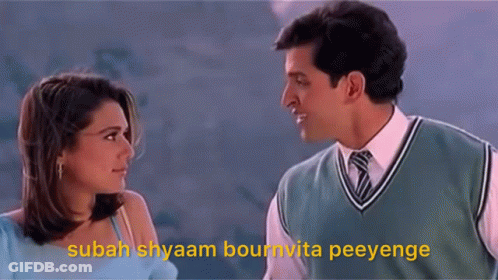 A Man And A Woman Are Looking At Each Other With A Caption That Says Sabah Shyam GIF