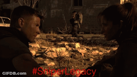 A Man And A Woman Are Looking At Each Other With The Hashtag #Sniperlegacy GIF