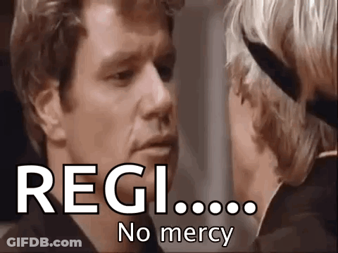 A Man And A Woman Are Looking At Each Other With The Words Regi No Mercy Written On The Screen . GIF