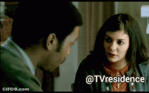 A Man And A Woman Are Looking At Each Other With The Words @Tvresidence Below Them GIF
