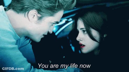 A Man And A Woman Are Looking At Each Other With The Words " You Are My Life Now " GIF