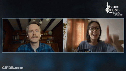 A Man And A Woman Are On A Video Call With The Words Mythic Quest Written On The Top GIF
