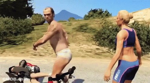 A Man And A Woman Are Playing A Video Game And The Man Is Wearing A Diaper And The Woman Is Wearing A Bikini GIF