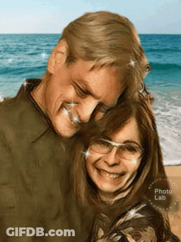 A Man And A Woman Are Posing For A Picture On The Beach With The Photo Lab Logo In The Corner GIF