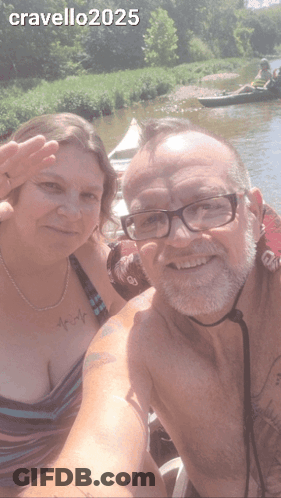 A Man And A Woman Are Posing For A Picture With The Year 2025 On The Bottom Right GIF