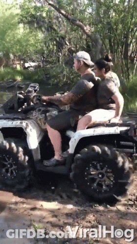 Man And Woman Riding ATV In Mud Viralhog Text GIF