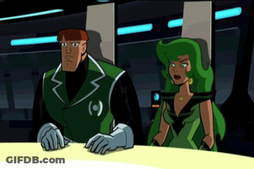 A Man And A Woman Are Sitting At A Table And The Man Is Wearing A Green Jacket With The Letter O On It GIF