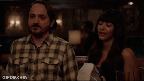 A Man And A Woman Are Sitting At A Table And The Man Says That 'S Right GIF