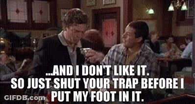 A Man And A Woman Are Sitting At A Table In A Restaurant With A Caption That Says And I Don T Like It GIF