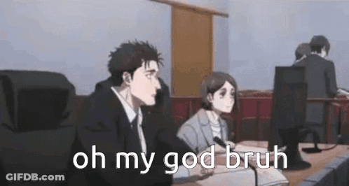 A Man And A Woman Are Sitting At A Table In Front Of A Microphone . GIF