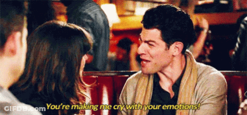 A Man And A Woman Are Sitting At A Table Talking To Each Other And The Man Is Saying You 'Re Making Me Cry GIF