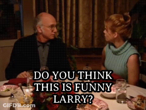A Man And A Woman Are Sitting At A Table With A Caption That Says " Do You Think This Is Funny Larry " GIF