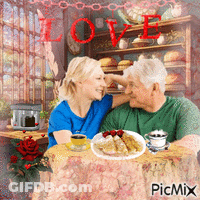 A Man And A Woman Are Sitting At A Table With A Plate Of Food And A Cup Of Coffee With The Word Love In Red GIF