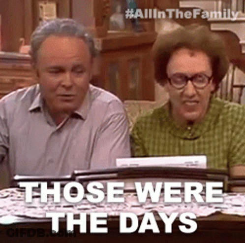 Man And Woman Sitting With Words Those Were The Days GIF