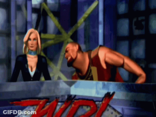 A Man And A Woman Are Sitting In Front Of A Sign That Says ' Twist ' GIF