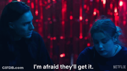 A Man And A Woman Are Sitting In Front Of Red Lights And The Man Says I 'M Afraid They 'Ll Get GIF