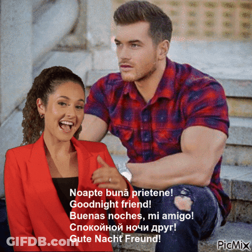 A Man And A Woman Are Sitting Next To Each Other And The Woman Is Laughing GIF