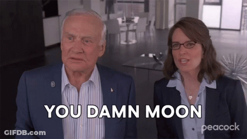 A Man And A Woman Are Sitting Next To Each Other And The Woman Is Saying You Damn Moon GIF
