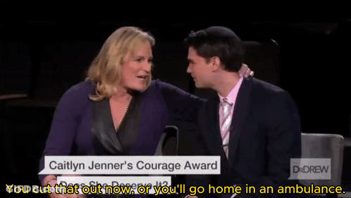 A Man And A Woman Are Sitting Next To Each Other And The Woman Is Talking About Caitlyn Jenner 'S Courage Award GIF
