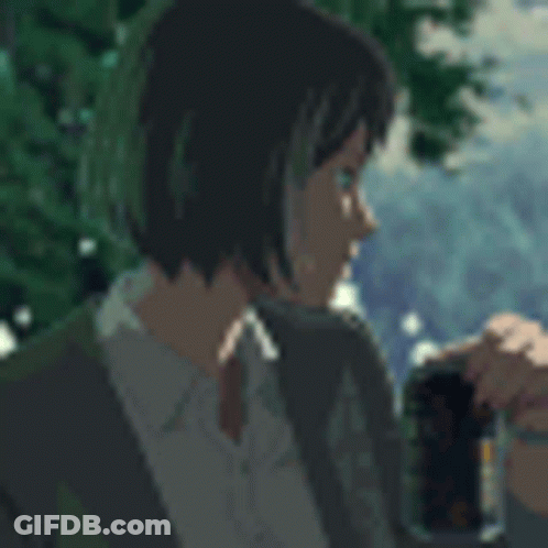 A Man And A Woman Are Sitting Next To Each Other Drinking From A Can Of Soda . GIF
