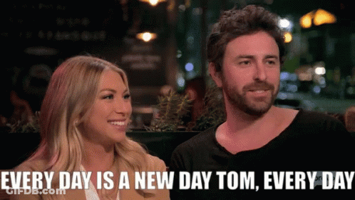 A Man And A Woman Are Sitting Next To Each Other With The Caption Every Day Is A New Day Tom Every Day GIF