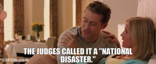 A Man And A Woman Are Sitting Next To Each Other With The Words " The Judges Called It A National Disaster " GIF