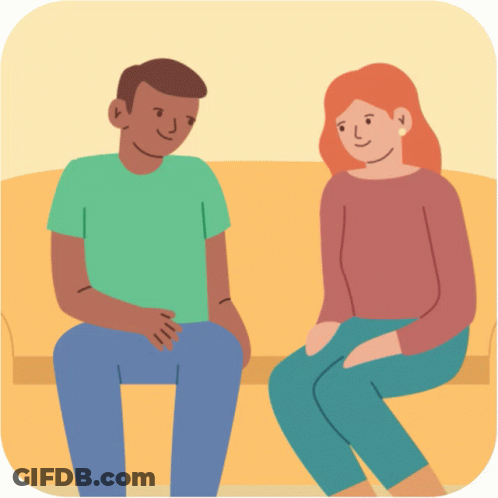 A Man And A Woman Are Sitting On A Couch And Smiling GIF