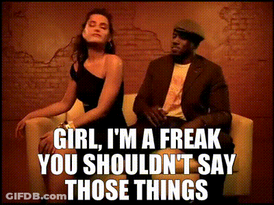 A Man And A Woman Are Sitting On A Couch And The Woman Says Girl I 'M A Freak GIF