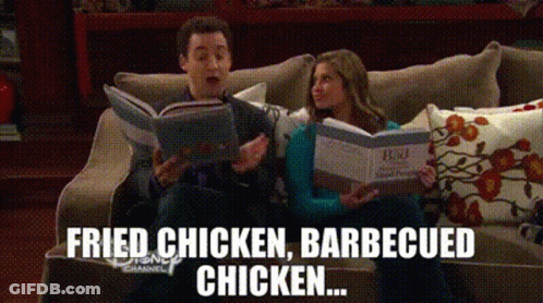 A Man And A Woman Are Sitting On A Couch Reading A Book And The Words Fried Chicken Barbecued Chicken Are Above Them GIF