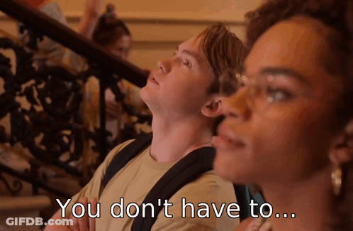 A Man And A Woman Are Sitting On A Set Of Stairs And The Man Says " You Don 'T Have To " GIF
