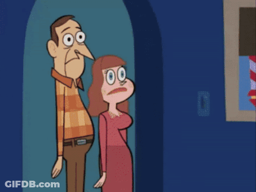 A Man And A Woman Are Standing In A Doorway GIF
