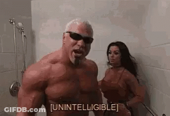 A Man And A Woman Are Standing In A Shower Together . GIF