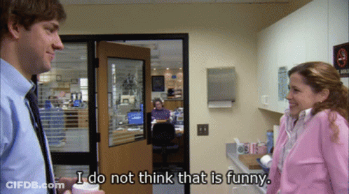 A Man And A Woman Are Standing In An Office And The Woman Says I Do Not Think That Is Funny GIF
