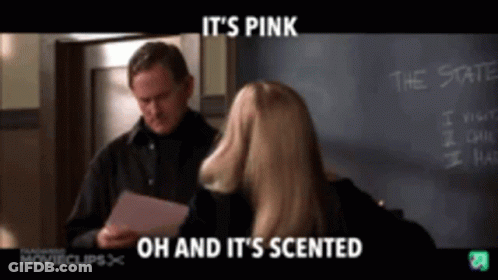 A Man And A Woman Are Standing In Front Of A Chalkboard That Says The State GIF