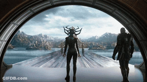 Man And Woman Standing By Lake Window GIF