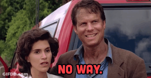 A Man And A Woman Are Standing In Front Of A Red Suv And The Man Says No Way GIF
